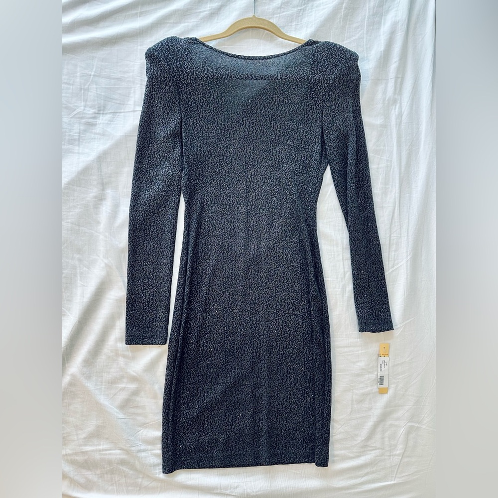Elegant Low back Dress with shoulder pads